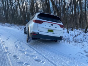 Kia stuck in snow on Black Mountain. Phone pic by Jeff Fyke